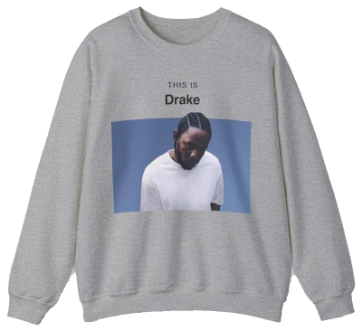 The This Is Drake Crewneck is a gray sweatshirt featuring a photo of a man in a white shirt looking down, with “THIS IS Drake” printed above—a stylish nod to iconic and funny shirts.