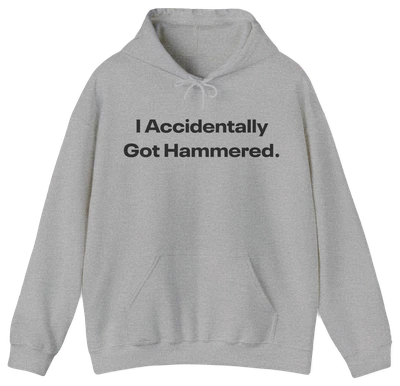 The I Accidentally Got Hammered. Hoodie from Illegal Shirts features bold black text on light gray, crafted from medium-heavy fabric with a front pocket and drawstrings for comfort and style.