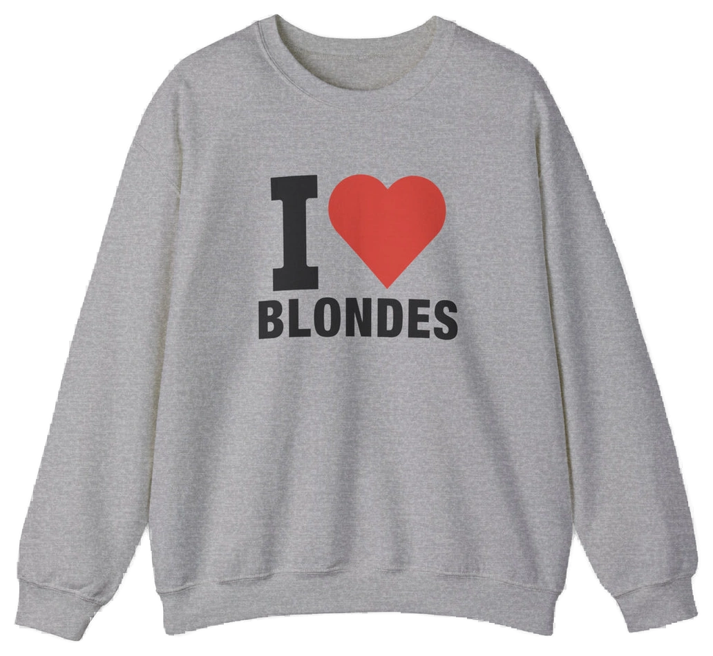 The I Heart Blondes Crewneck is a gray cotton-polyester sweatshirt with bold black lettering and a red heart on the front. Part of the Illegal Shirts collection, it's an eye-catching piece for anyone who loves standout style.