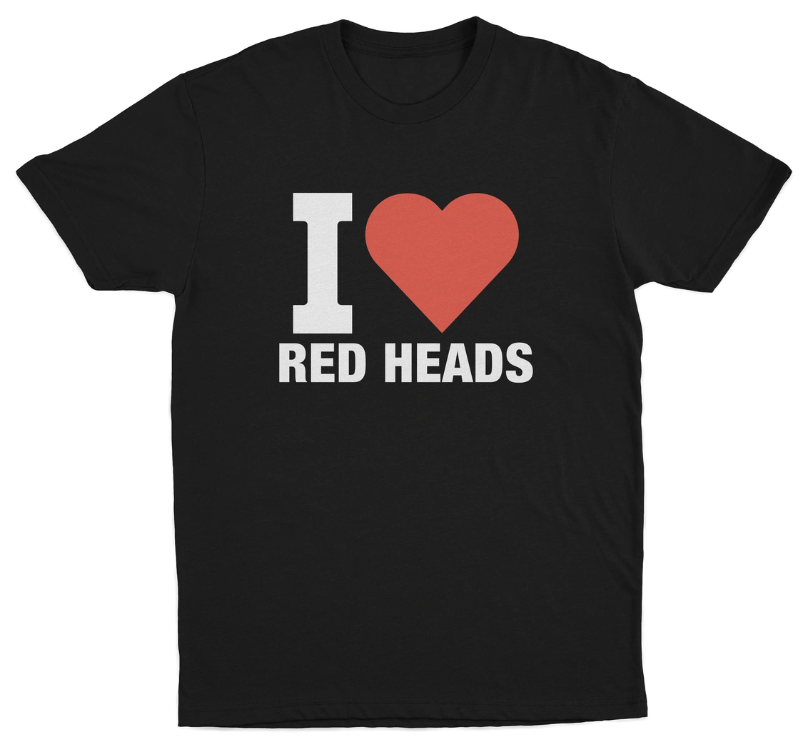 The I Heart Red Heads T-Shirt is crafted from high-quality cotton and features "I" with a bold red heart and "RED HEADS" in white—perfect for anyone who loves playful, statement tees!.
