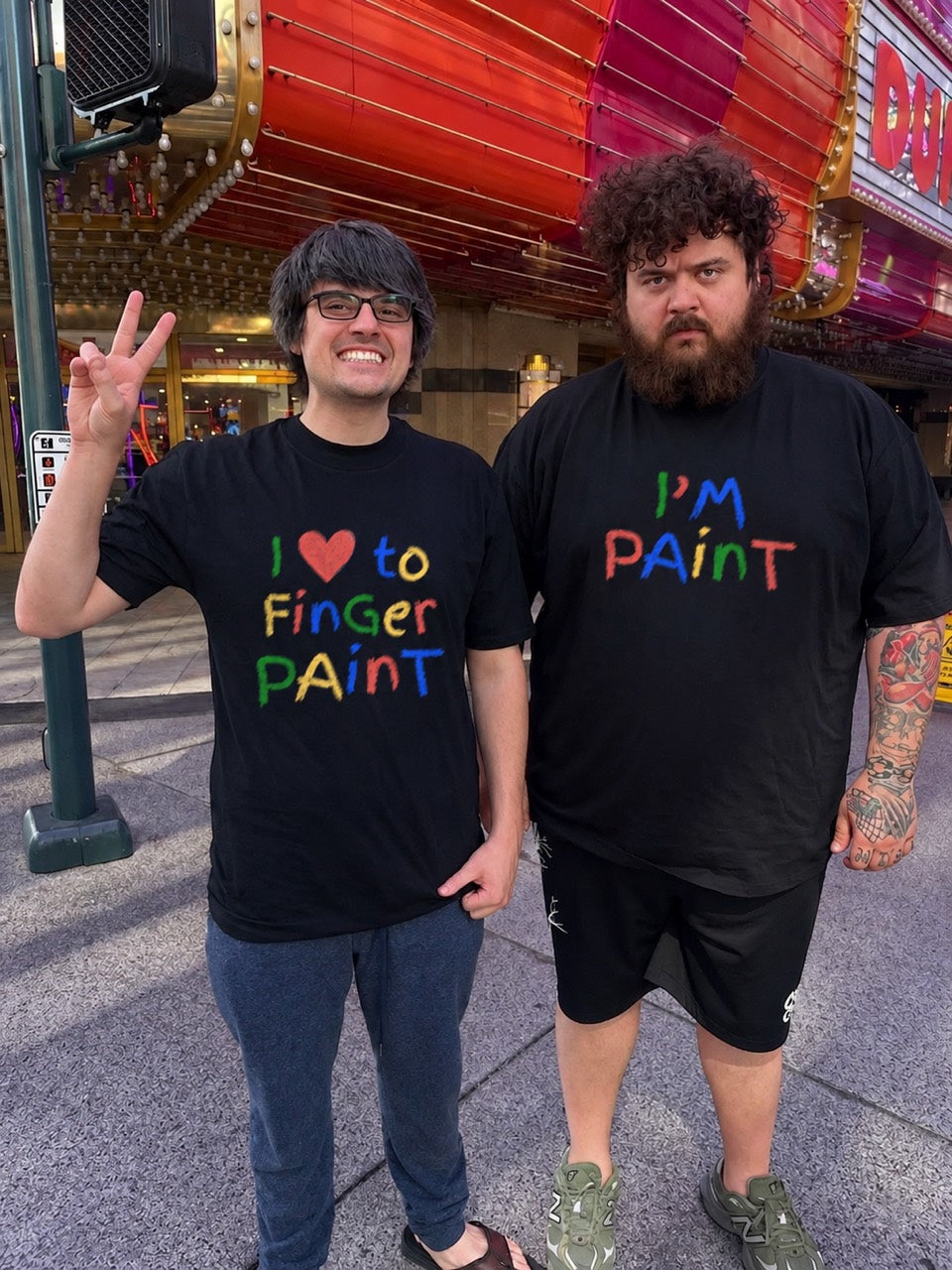 Two people wearing matching I Heart To Finger Paint and I Am Paint shirts