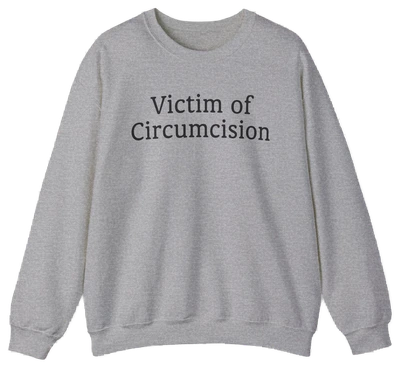 The Victim Of Circumcision Crewneck is a gray sweatshirt from the Illegal Shirts collection, made of medium-heavy fabric and featuring bold black "Victim of Circumcision" text across the front.