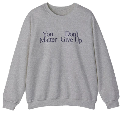 A gray crewneck called "You Don't Matter Give Up" features dark blue lettering on medium-heavy fabric—ideal for comfort with a bold message that stands out from standard Illegal Shirts.