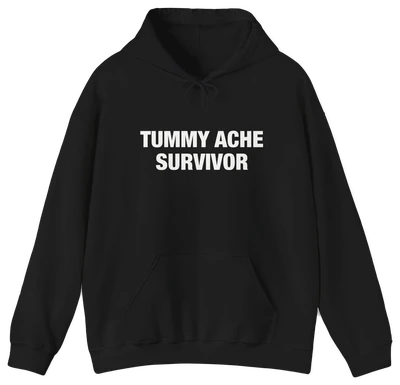 The Tummy Ache Survivor Hoodie is a black cotton-polyester sweatshirt with "TUMMY ACHE SURVIVOR" on the chest, front pocket, drawstring hood, and is part of our signature Illegal Shirts collection.