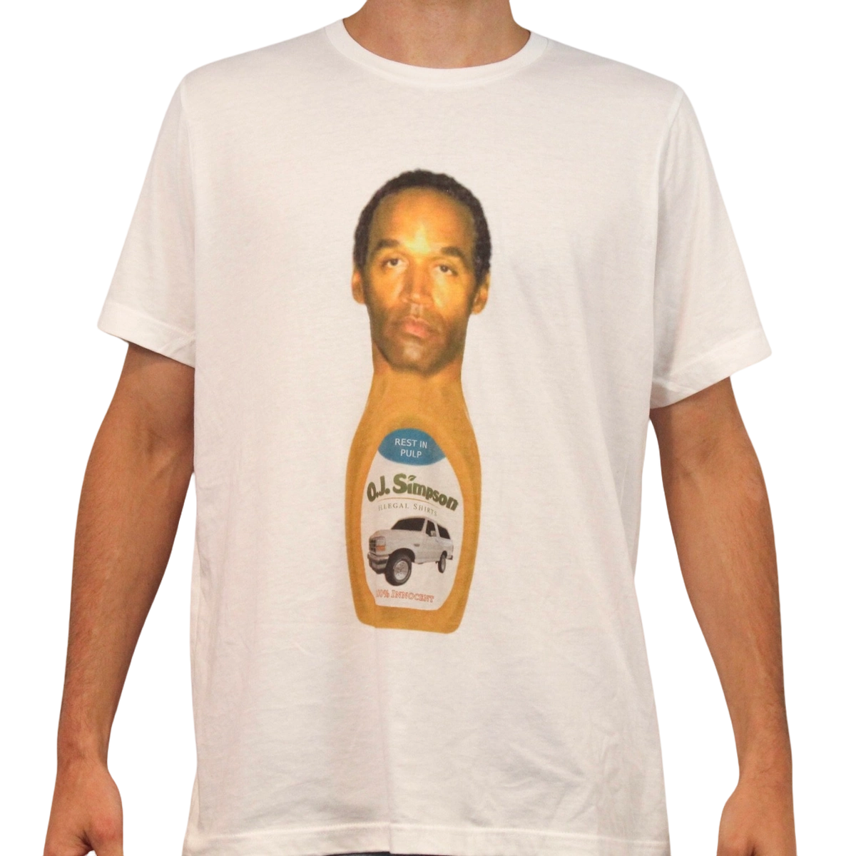 Wearing the 100% cotton, ethically made O.J. Simpson T-Shirt, which features his face on a ketchup bottle with a car and the phrase “Rest in pulp O.J. Simpson” on the label.