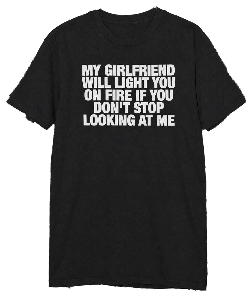 My Girlfriend Will Light You On Fire If You Don't Stop Looking At Me T-Shirt — Hanging view (AI-generated styled mockup)