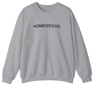The Homiesexual Crewneck by Illegal Shirts is a light gray medium-heavy sweatshirt with "HOMIESEXUAL" in bold black letters across the chest, shown laid flat on a white background.