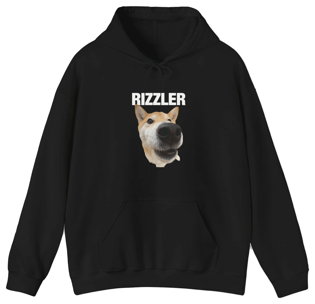 The Rizzler Hoodie is a black, medium-heavy hoodie with a large front graphic of a dog’s face with a distorted snout and the bold white RIZZLER design above the image.