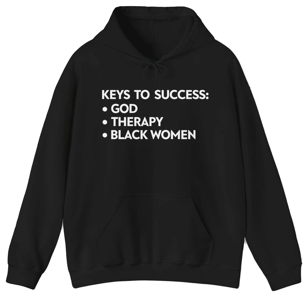 The Keys To Success Hoodie by Illegal Shirts is a black cotton-polyester hoodie featuring "KEYS TO SUCCESS: • GOD • THERAPY • BLACK WOMEN" printed in bold white uppercase letters on the front.