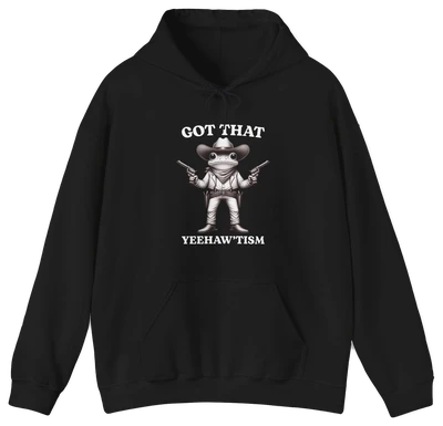 The Got That Yeehaw'Tism Hoodie is a black, medium-heavy hoodie featuring a cartoon cowboy frog with pistols and the phrase "Got That Yeehaw'Tism" above and below the image—a standout for any Illegal Shirts collection.