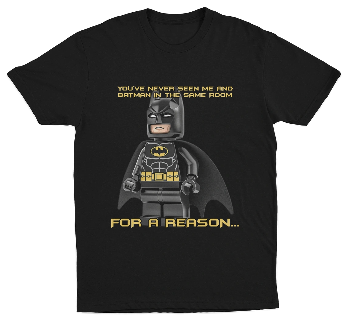 The "You've Never Seen Me And Batman In The Same Room For A Reason..." T-Shirt features bold yellow text, making it a fun conversation starter and a must-have for fans of funny graphic tees.