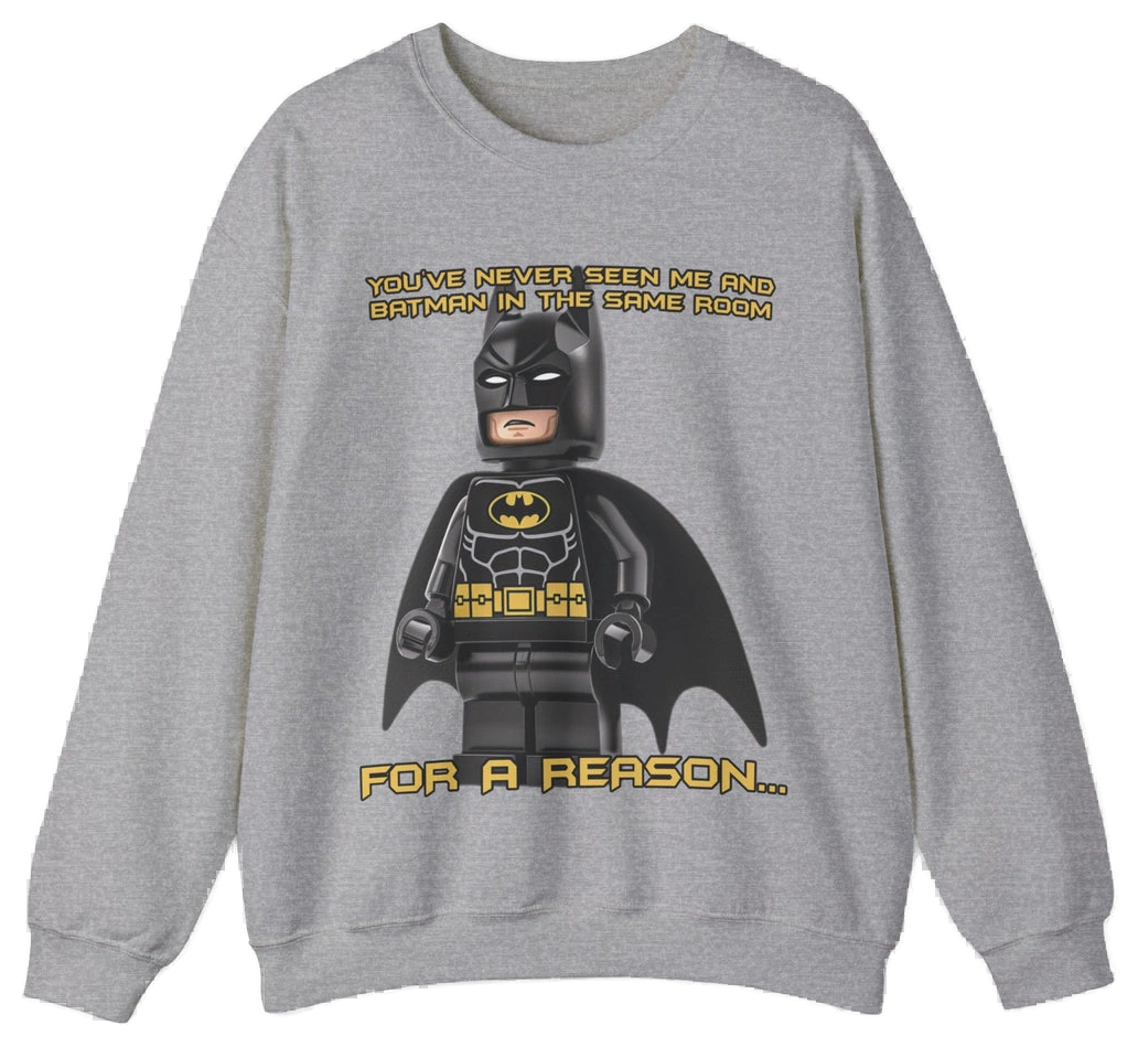 The "You've Never Seen Me And Batman In The Same Room For A Reason..." Crewneck features a gray LEGO Batman design with witty yellow text—perfect for fans seeking a fun, conversation-starting shirt.