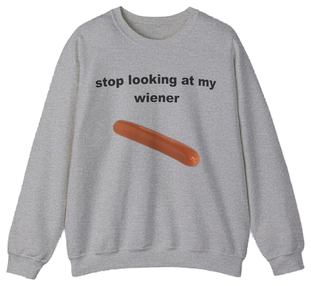 The Stop Looking At My Wiener Crewneck is a grey sweatshirt with a playful hot dog graphic—ideal for anyone who loves fun, eye-catching shirts.