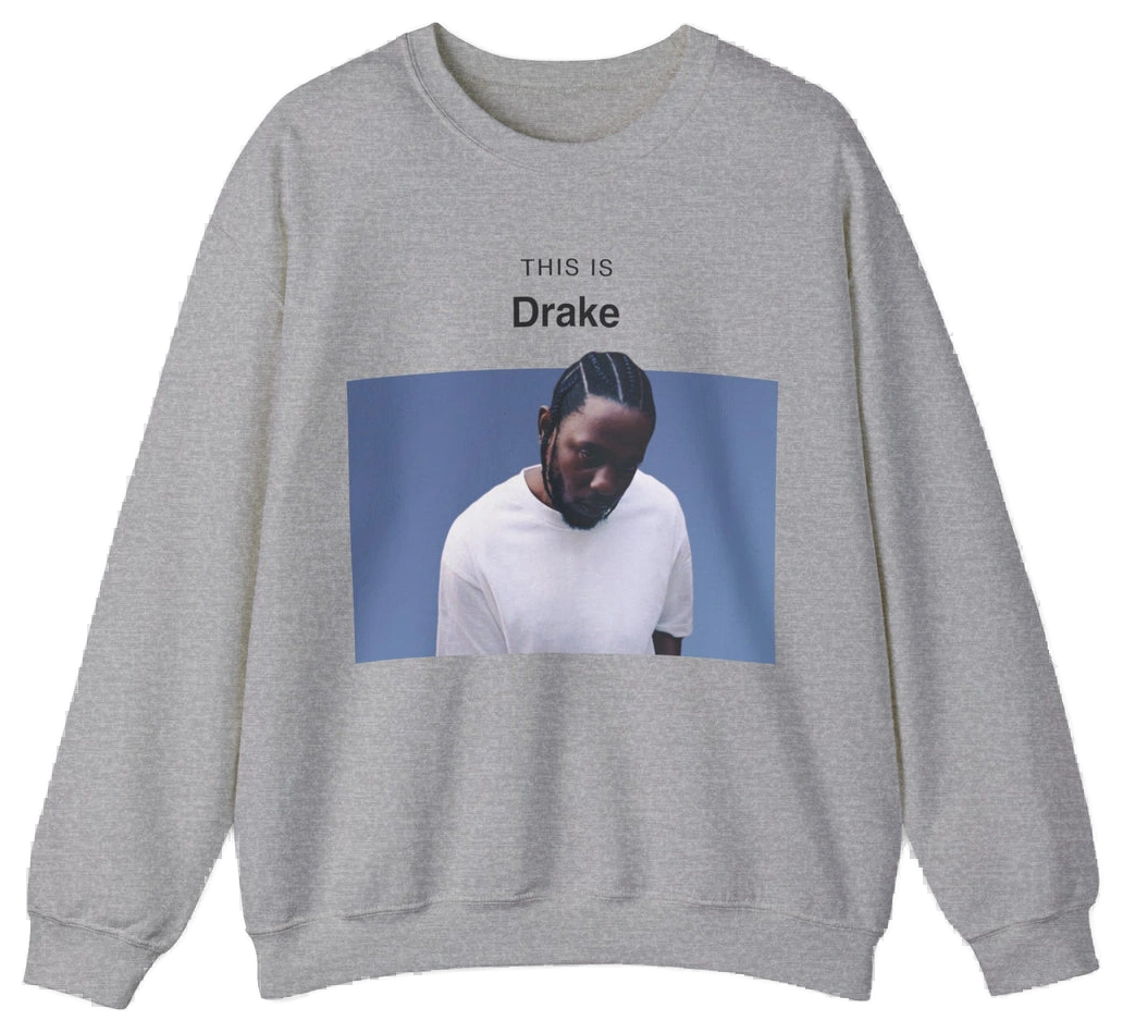 The This Is Drake Crewneck is a gray sweatshirt featuring a photo of a man in a white shirt looking down, with “THIS IS Drake” printed above—a stylish nod to iconic and funny shirts.